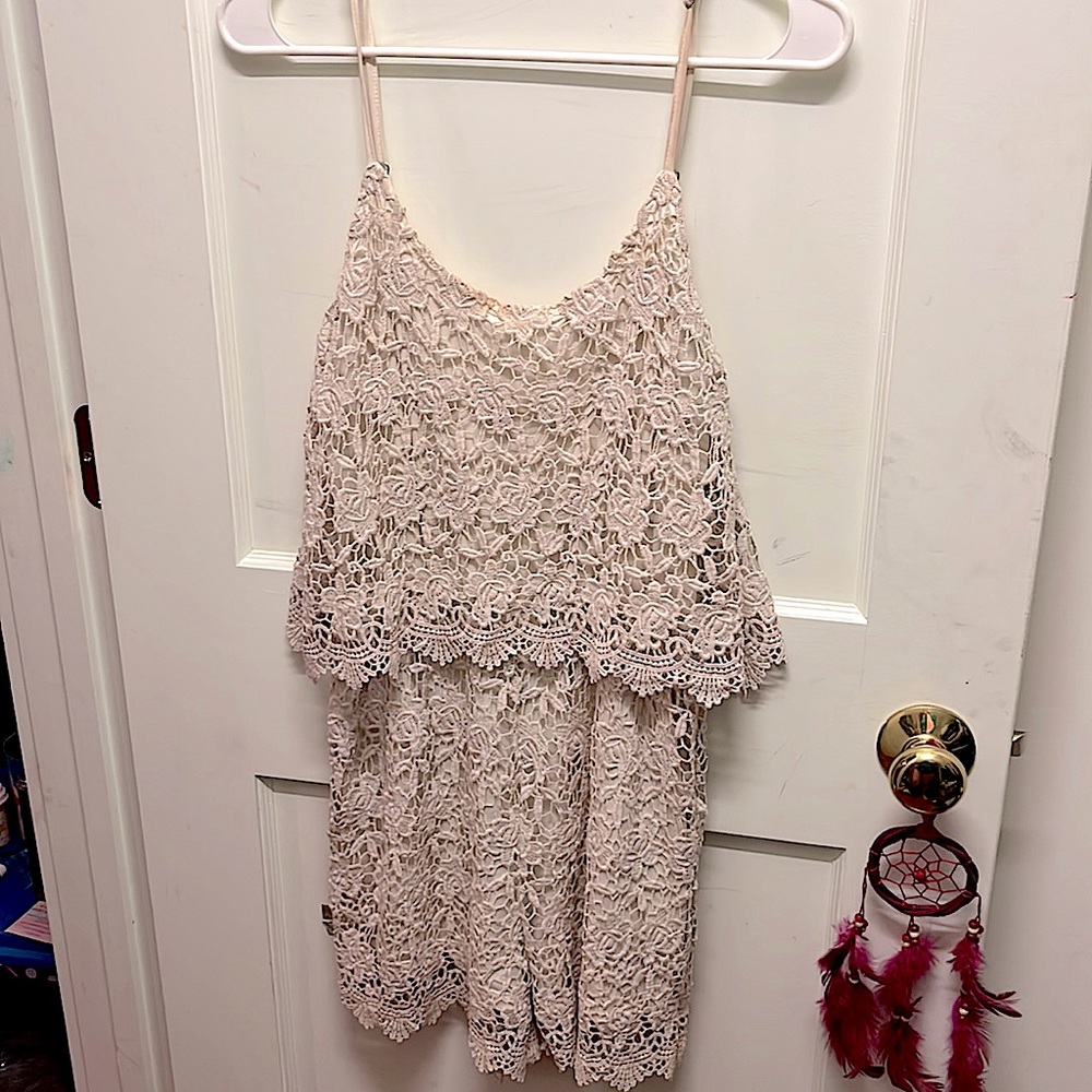 Beige romper with knitting design over top brand poof! Size M